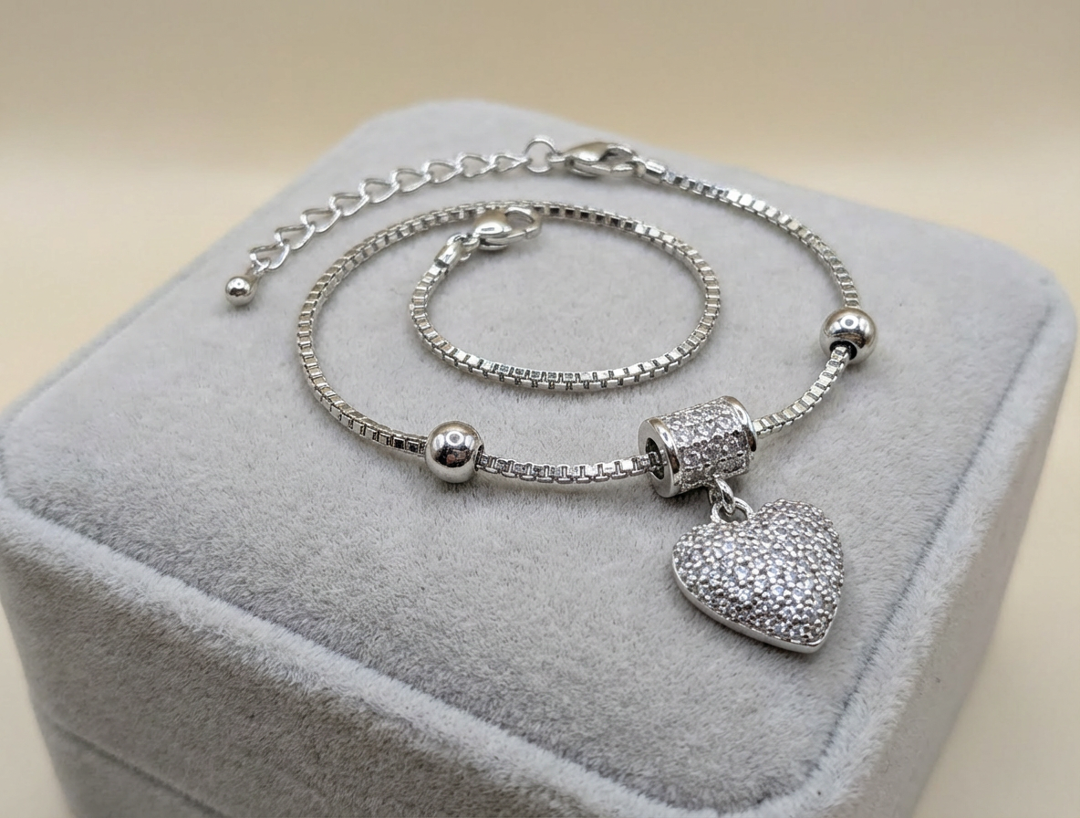 Elegant Sparkle: Silver Heart Charm Bracelet - Image 2