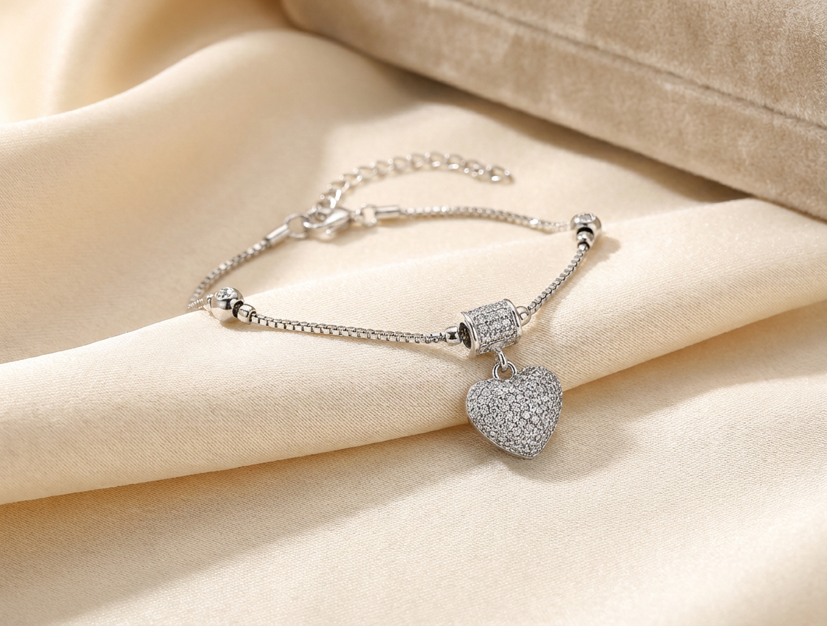 Elegant Sparkle: Silver Heart Charm Bracelet
