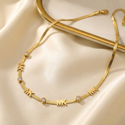 Luxe Monogram 'MK' Gold Snake Chain Necklace with Crystal Stations